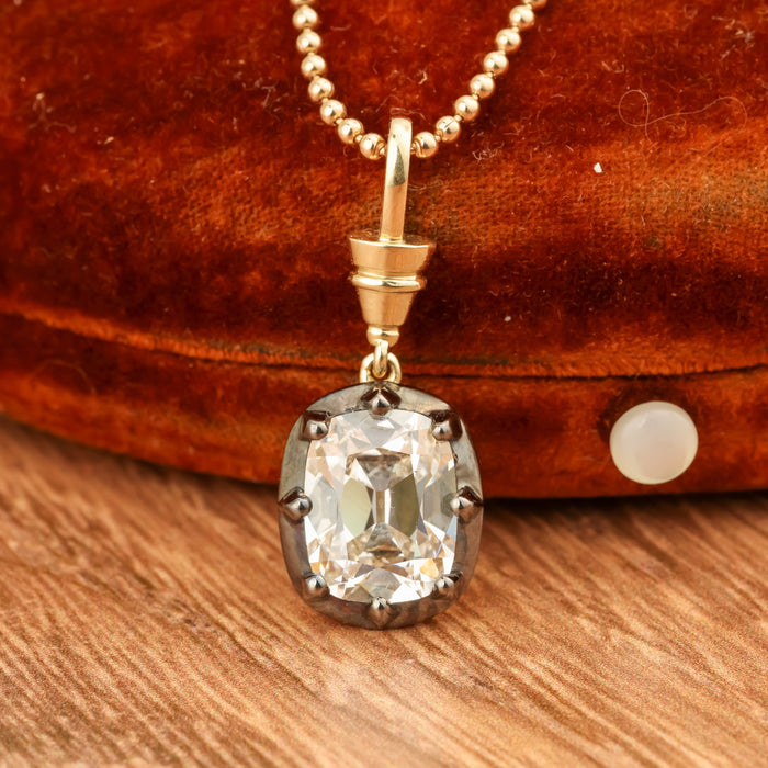 Old mine cut lab-grown diamond collet pendant in yellow gold and blackened gold