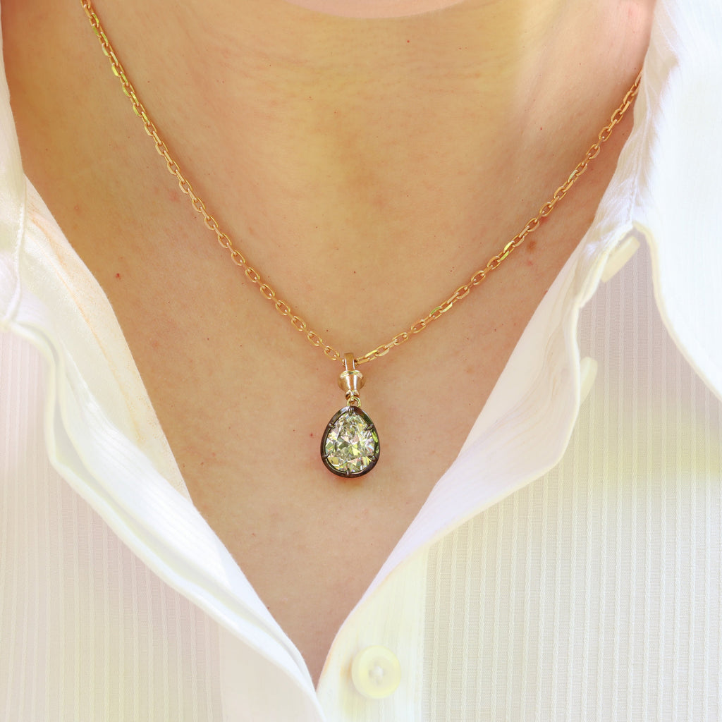 Antique pear cut lab-grown diamond collet pendant in yellow gold and blackened platinum, view 2