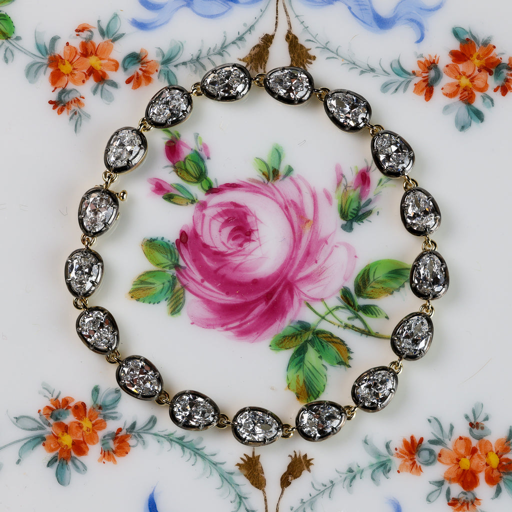 The Caroline Bracelet: collet-set antique pear cut lab-grown diamonds in blackened platinum over 18K yellow gold, view 2