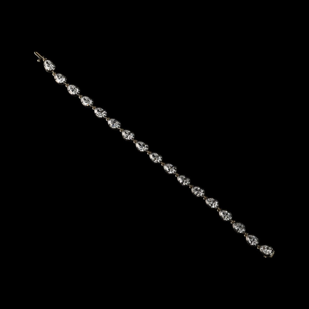 The Caroline Bracelet: collet-set antique pear cut lab-grown diamonds in blackened platinum over 18K yellow gold, view 4