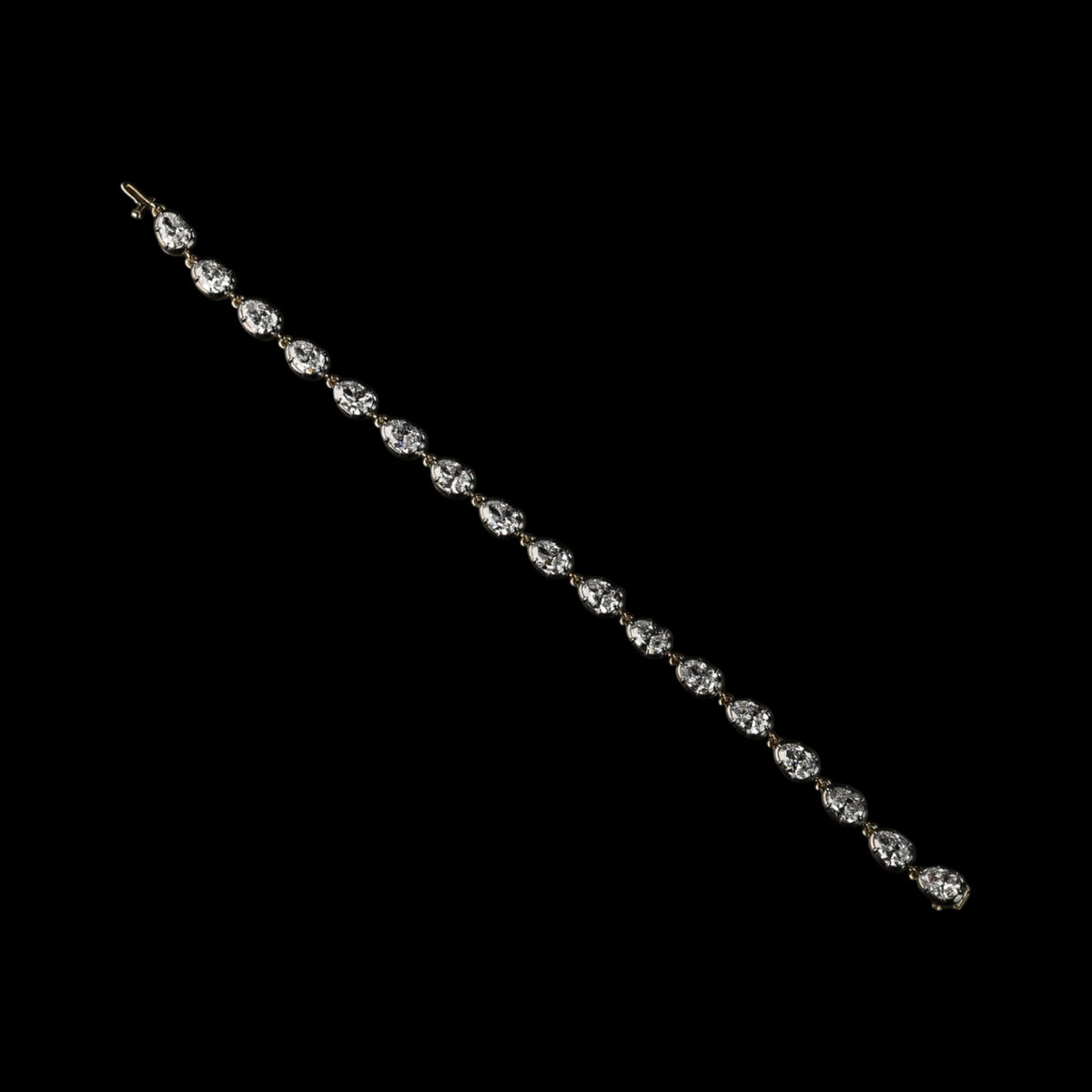 The Caroline Bracelet: collet-set antique pear cut lab-grown diamonds in blackened platinum over 18K yellow gold, view 4