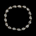 The Caroline Bracelet: collet-set antique pear cut lab-grown diamonds in blackened platinum over 18K yellow gold