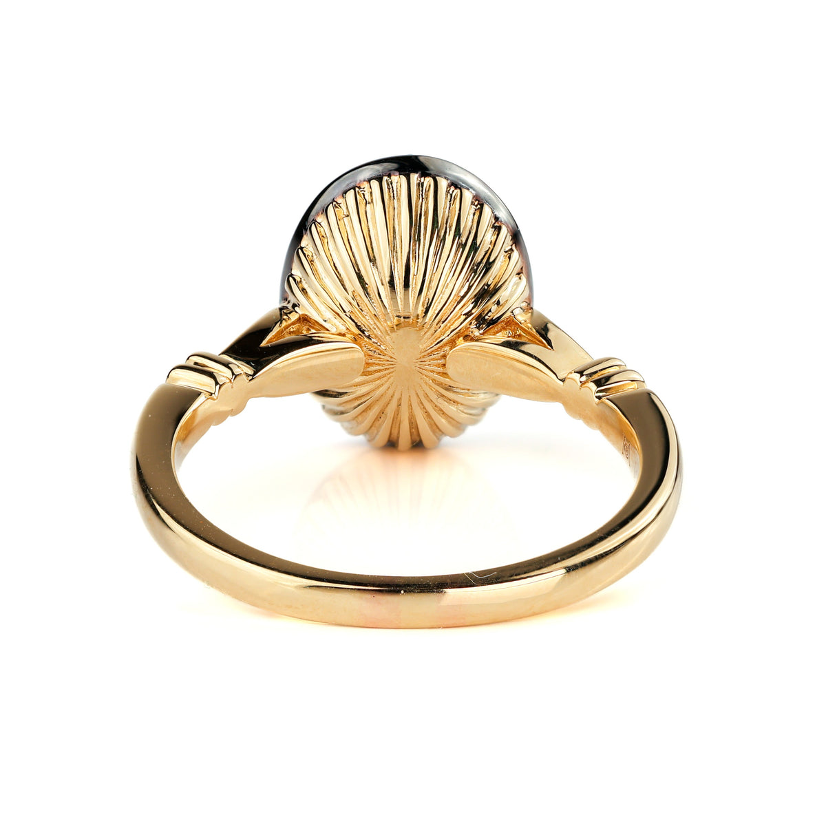The Caroline ring: antique oval lab-grown diamond in a blackened collet on a yellow gold snake shank, view 5