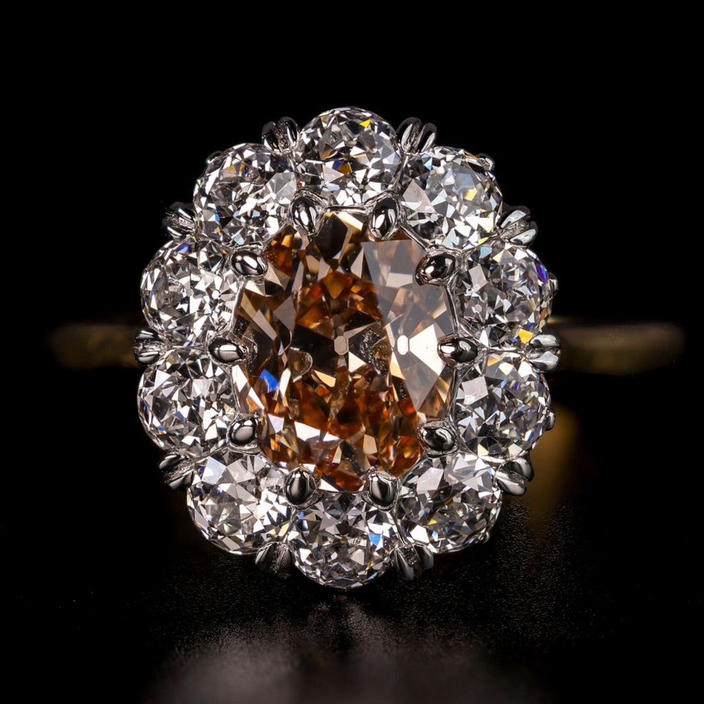 The Zahra: cognac antique oval lab-grown diamond in a cluster of old European cut lab-grown diamonds, platinum and 18K yellow gold